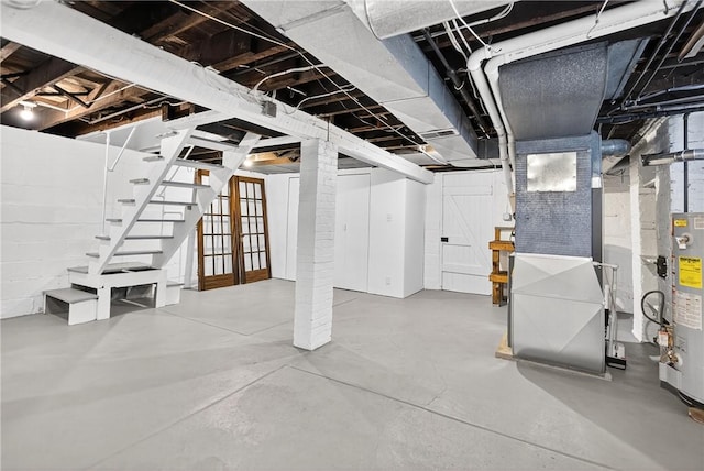 222 S 8th St, West Newton, PA 15089 - unfinished basement with stairway, heating unit, and gas water heater