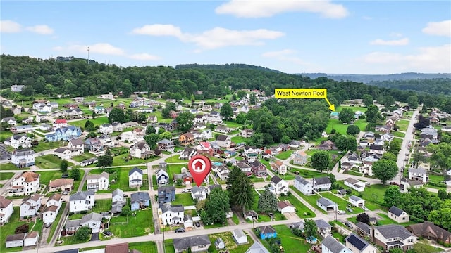 222 S 8th St, West Newton, PA 15089 - aerial overview of property's location with a heavily wooded area
