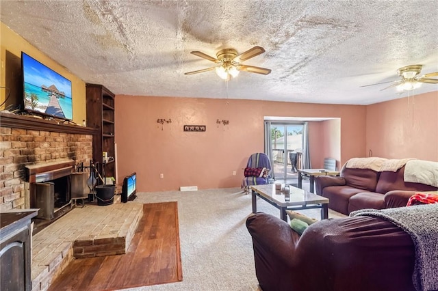 168 Debernardo Ln, Mahoning Twp, PA 16132 - living room with a ceiling fan, a brick fireplace, a textured ceiling, carpet, and built in shelves
