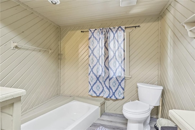 168 Debernardo Ln, Mahoning Twp, PA 16132 - full bathroom featuring wood walls, wood finished floors, and tub / shower combination