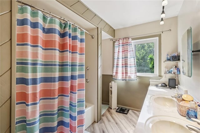 168 Debernardo Ln, Mahoning Twp, PA 16132 - full bath with wood finished floors, double vanity, and shower / bath combination with curtain