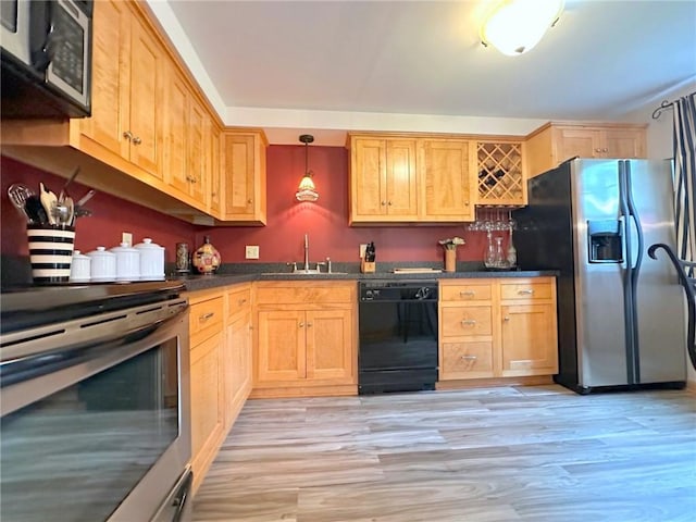 157 Aberdeen Dr, Mccandless, PA 15237 - kitchen with appliances with stainless steel finishes, light wood finished floors, dark countertops, hanging light fixtures, and light brown cabinetry