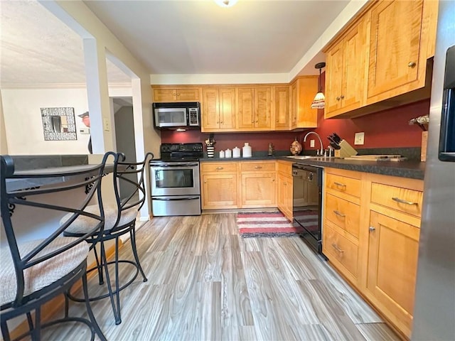 157 Aberdeen Dr, Mccandless, PA 15237 - kitchen with appliances with stainless steel finishes, dark countertops, and light wood finished floors