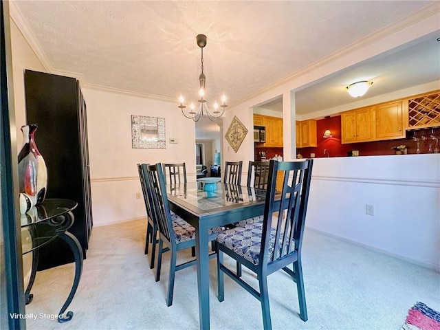 157 Aberdeen Dr, Mccandless, PA 15237 - dining area with light carpet, a chandelier, and ornamental molding