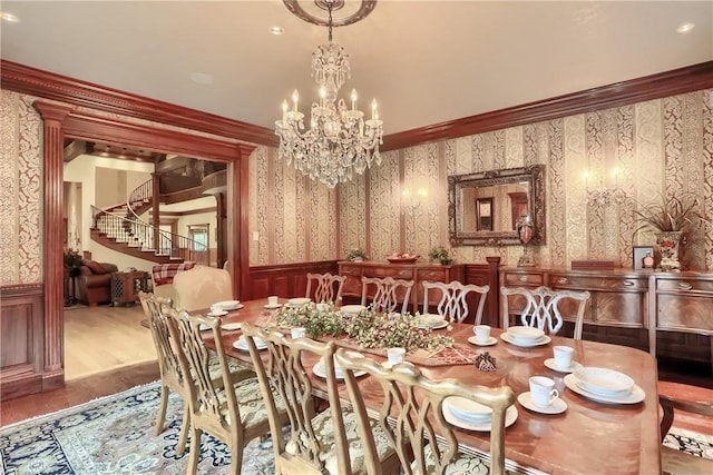 399 Cornetti Rd, Clearfield Twp, PA 16034 - dining room featuring wallpapered walls, wainscoting, ornamental molding, wood finished floors, and a chandelier