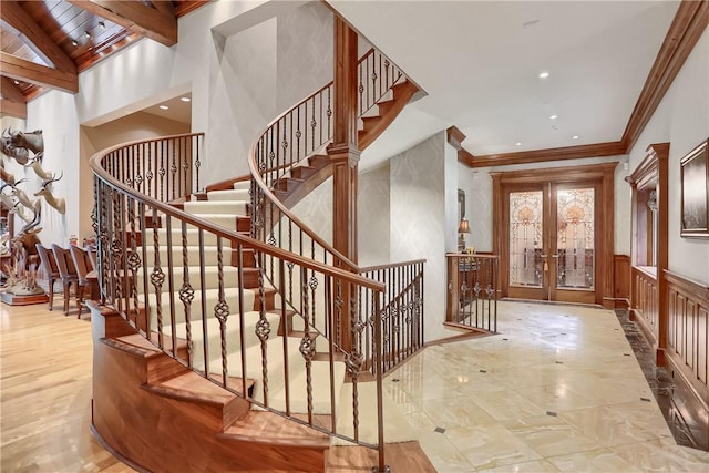 399 Cornetti Rd, Clearfield Twp, PA 16034 - stairway featuring french doors, ornamental molding, wainscoting, and recessed lighting