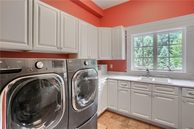 399 Cornetti Rd, Clearfield Twp, PA 16034 - washroom featuring washer and clothes dryer, cabinet space, and light tile patterned floors