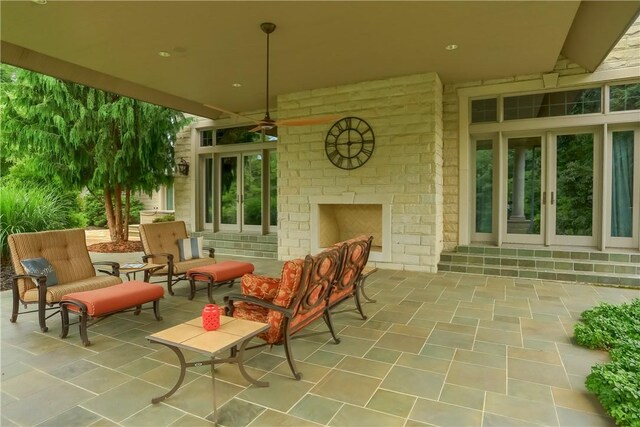 399 Cornetti Rd, Clearfield Twp, PA 16034 - view of patio with an outdoor brick fireplace