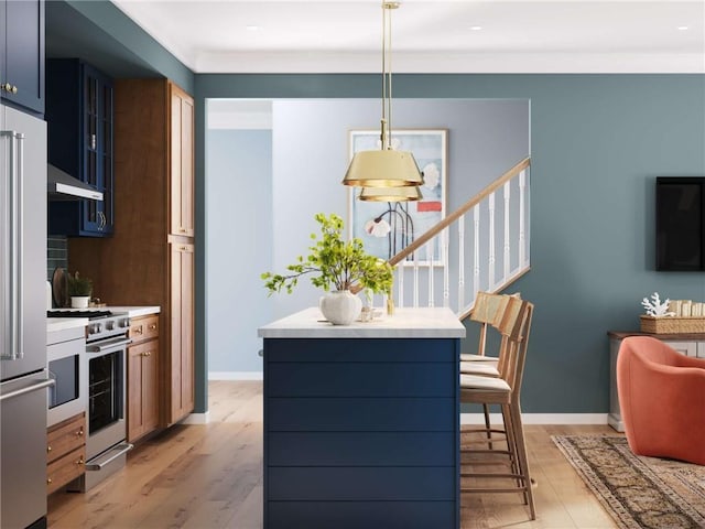 705 Bower St, Cranberry Twp, PA 16066 - kitchen featuring high quality appliances, light wood-type flooring, decorative light fixtures, light countertops, and extractor fan