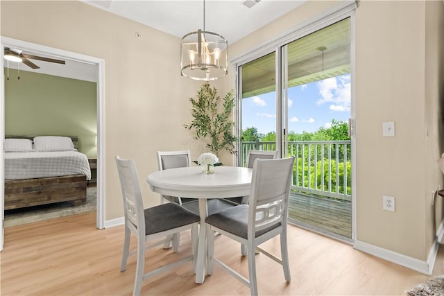 219 Stockton Rdg, Cranberry Twp, PA 16066 - dining room featuring light wood-type flooring, a chandelier, and ceiling fan