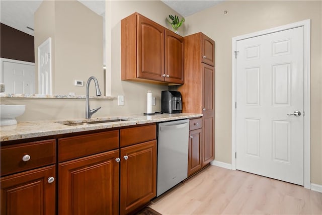 219 Stockton Rdg, Cranberry Twp, PA 16066 - kitchen featuring dishwasher, light stone countertops, and brown cabinets