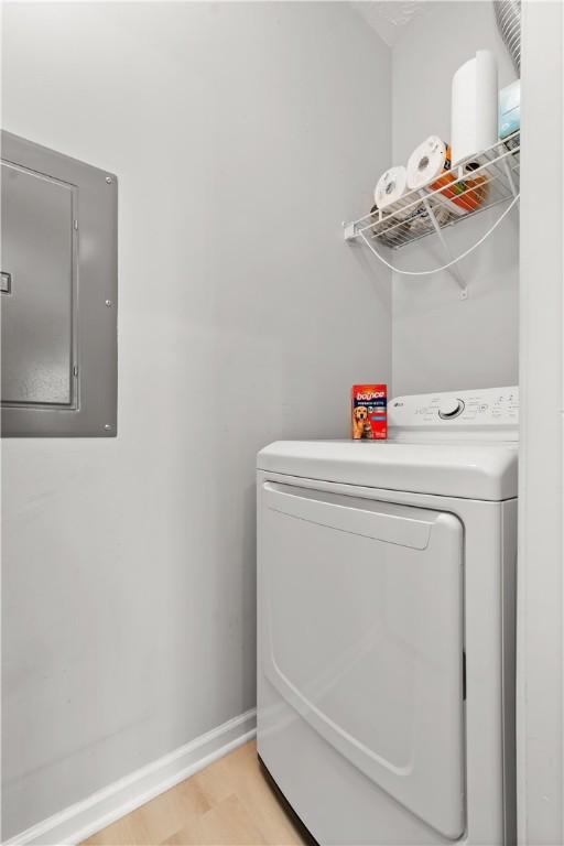 219 Stockton Rdg, Cranberry Twp, PA 16066 - laundry room with washer / dryer, electric panel, and light wood-type flooring