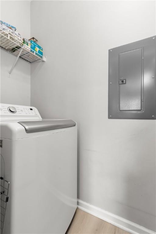 219 Stockton Rdg, Cranberry Twp, PA 16066 - laundry area featuring washer / dryer, electric panel, and light wood-style floors