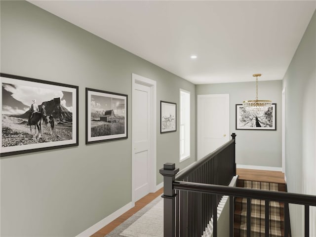 3500 Unionville Rd Bromley, Bromley, Cranberry Twp, PA 16066 - hallway with an upstairs landing, a chandelier, wood finished floors, and recessed lighting