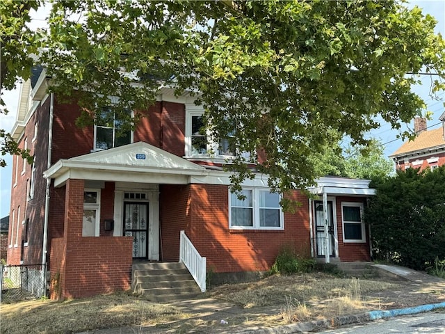 2019 Jenny Lind St, Mckeesport, PA 15132 - view of front facade featuring brick siding
