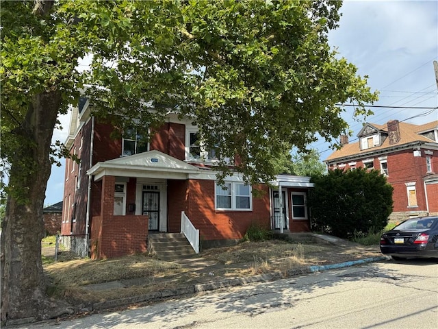 2019 Jenny Lind St, Mckeesport, PA 15132 - american foursquare style home featuring brick siding