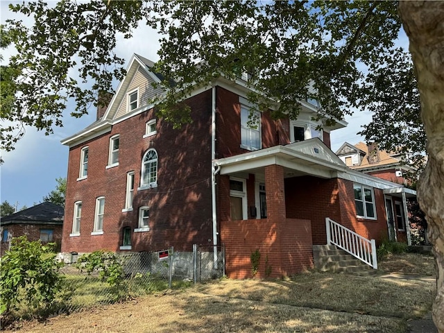 2019 Jenny Lind St, Mckeesport, PA 15132 - view of side of home featuring brick siding and a chimney