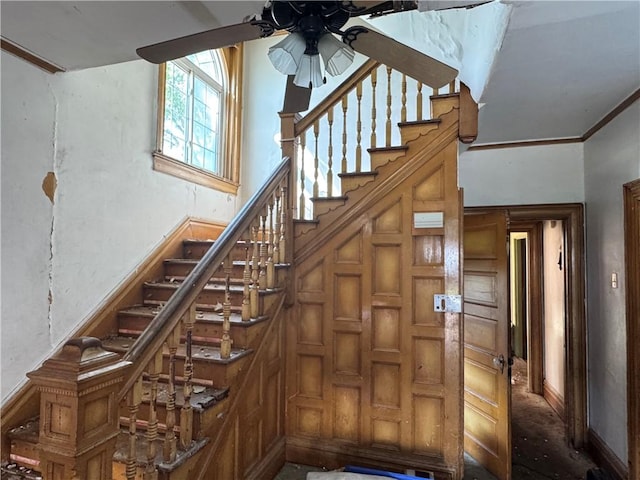 2019 Jenny Lind St, Mckeesport, PA 15132 - stairs with a ceiling fan and baseboards