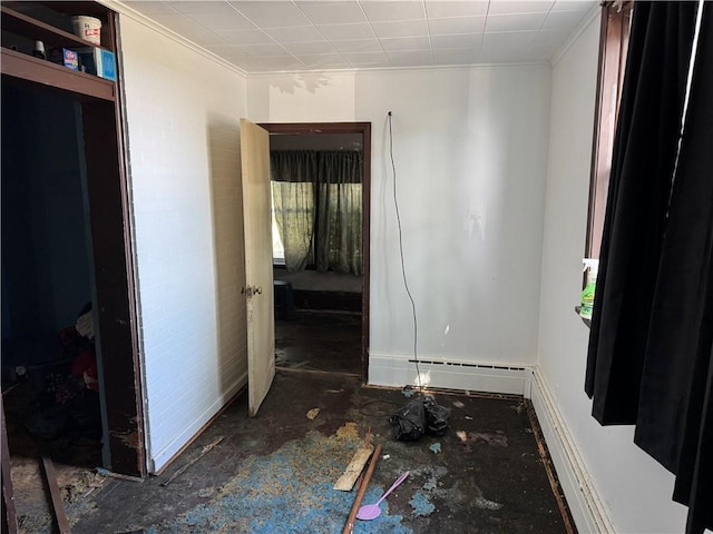 2019 Jenny Lind St, Mckeesport, PA 15132 - unfurnished room featuring crown molding and a baseboard heating unit