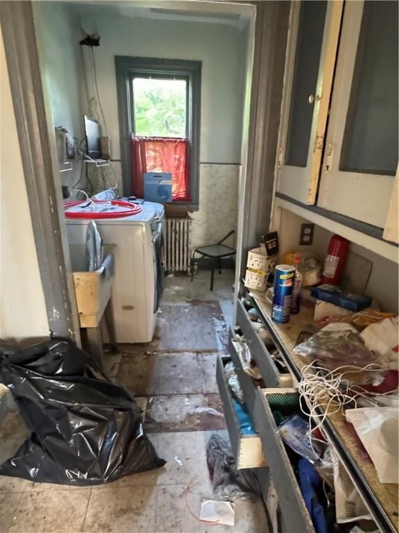 2019 Jenny Lind St, Mckeesport, PA 15132 - kitchen with washing machine and dryer and radiator heating unit