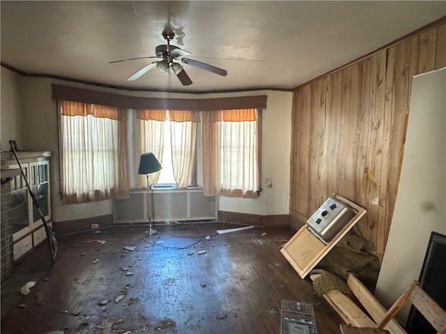 2019 Jenny Lind St, Mckeesport, PA 15132 - spare room with a ceiling fan, wooden walls, and ornamental molding
