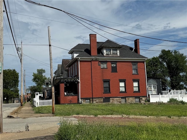2019 Jenny Lind St, Mckeesport, PA 15132 - view of property exterior featuring a chimney and brick siding