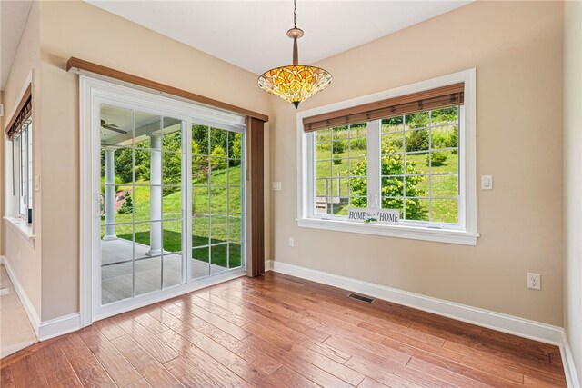416 Willow Ct, Allegheny Twp, PA 15613 - unfurnished dining area featuring hardwood / wood-style flooring and plenty of natural light