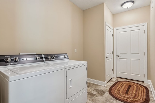 416 Willow Ct, Allegheny Twp, PA 15613 - washroom with washing machine and clothes dryer and baseboards