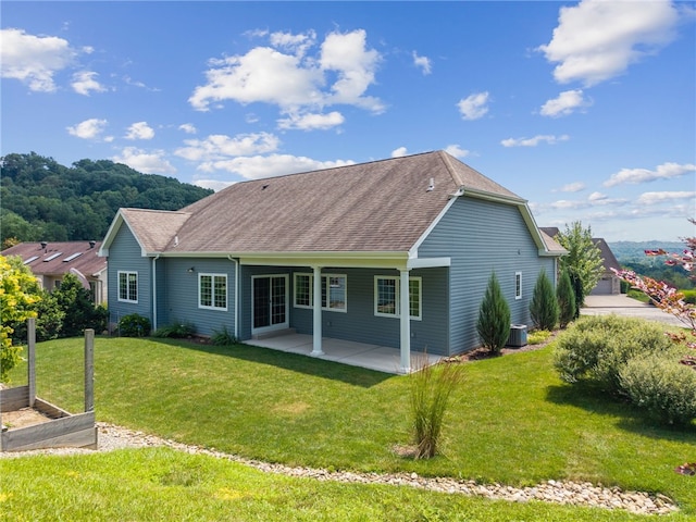 416 Willow Ct, Allegheny Twp, PA 15613 - back of house featuring a vegetable garden, roof with shingles, a yard, and a patio area