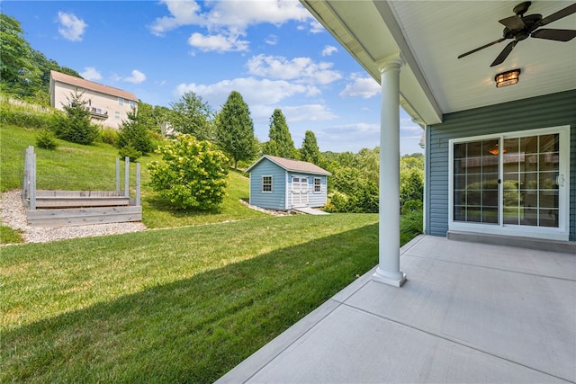416 Willow Ct, Allegheny Twp, PA 15613 - view of green lawn with a ceiling fan and an outbuilding