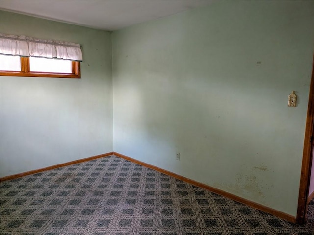 308 E Highland Ave, Ebensburg, PA 15931 - spare room featuring dark carpet and baseboards