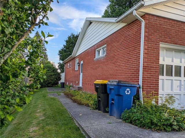 308 E Highland Ave, Ebensburg, PA 15931 - view of side of property with brick siding and a lawn
