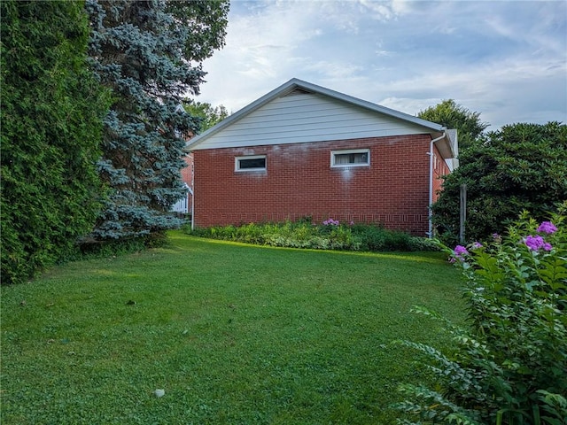 308 E Highland Ave, Ebensburg, PA 15931 - view of property exterior featuring brick siding and a lawn