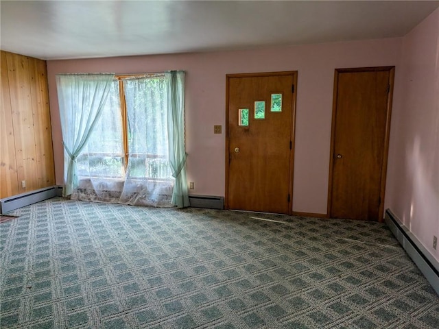 308 E Highland Ave, Ebensburg, PA 15931 - carpeted entrance foyer featuring a baseboard heating unit, baseboard heating, and wooden walls