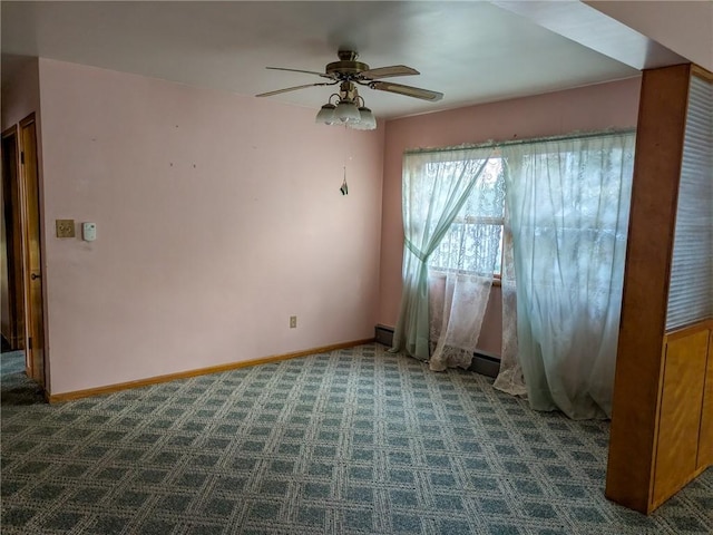 308 E Highland Ave, Ebensburg, PA 15931 - unfurnished room with dark carpet, ceiling fan, and a baseboard heating unit