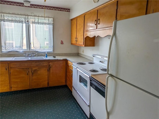 308 E Highland Ave, Ebensburg, PA 15931 - kitchen with white appliances, light countertops, and brown cabinetry