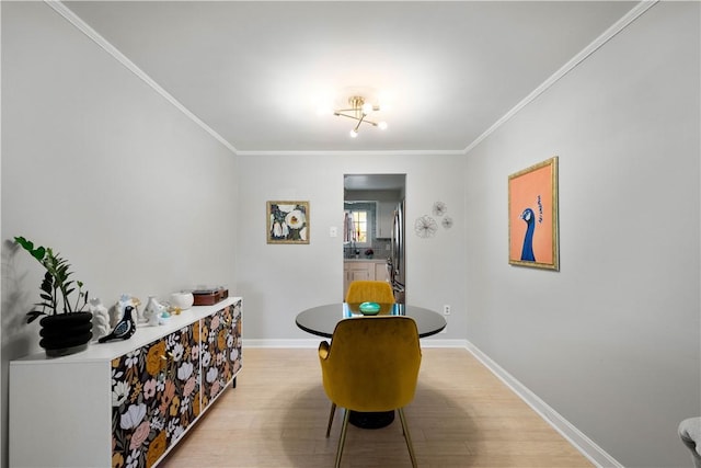 507 Sewickley Heights Dr, Aleppo, PA 15143 - dining space featuring light wood finished floors and ornamental molding