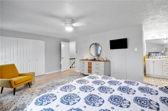 507 Sewickley Heights Dr, Aleppo, PA 15143 - bedroom featuring a textured ceiling, a ceiling fan, a closet, and ensuite bathroom