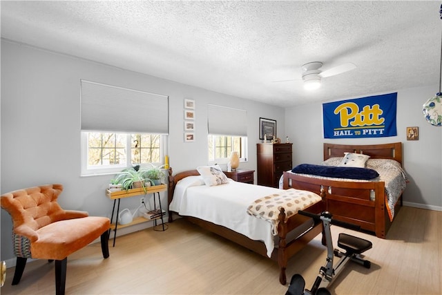 507 Sewickley Heights Dr, Aleppo, PA 15143 - bedroom featuring a textured ceiling, wood finished floors, and ceiling fan