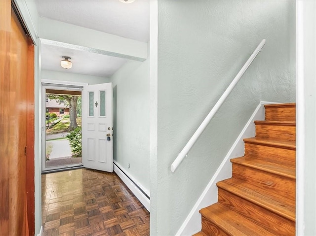 119 Abington Dr, Mt Lebanon, PA 15216 - entrance foyer with a baseboard heating unit, stairway, and a textured wall