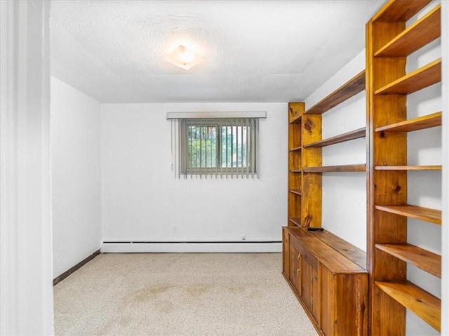 119 Abington Dr, Mt Lebanon, PA 15216 - carpeted empty room featuring a baseboard radiator and baseboards