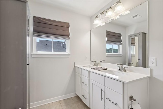306 Helenium Dr, Adams Twp, PA 16046 - bathroom with double vanity and tile patterned floors