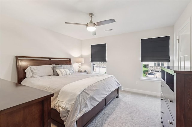 306 Helenium Dr, Adams Twp, PA 16046 - bedroom with light colored carpet, multiple windows, and a ceiling fan