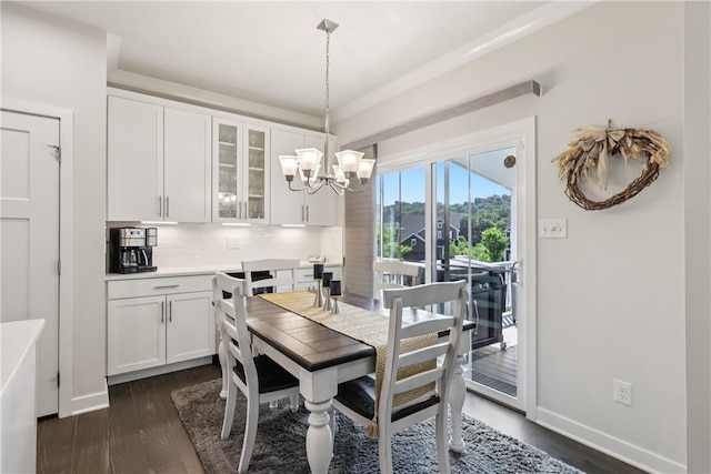 306 Helenium Dr, Adams Twp, PA 16046 - dining space with a chandelier and dark wood-style flooring