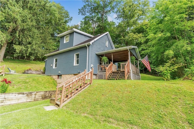 203 Stoney Hollow Rd, Winfield Twp, PA 16023 - back of house with stairway, a wooden deck, and a lawn