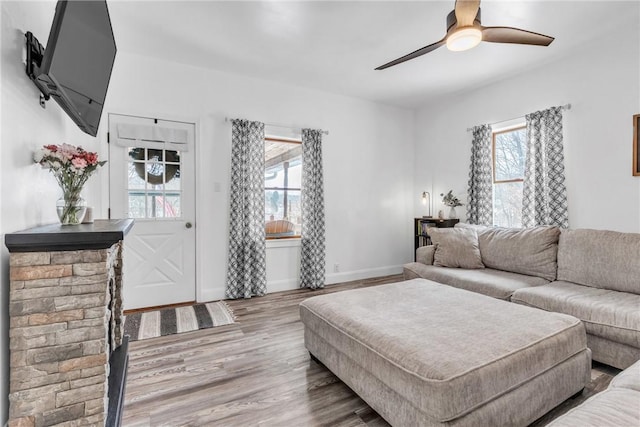 203 Stoney Hollow Rd, Winfield Twp, PA 16023 - living area with healthy amount of natural light, ceiling fan, and wood finished floors
