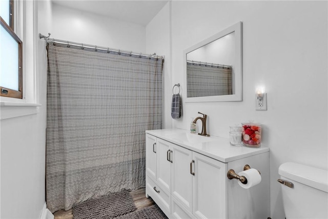 203 Stoney Hollow Rd, Winfield Twp, PA 16023 - full bath featuring vanity, wood finished floors, and a shower with shower curtain