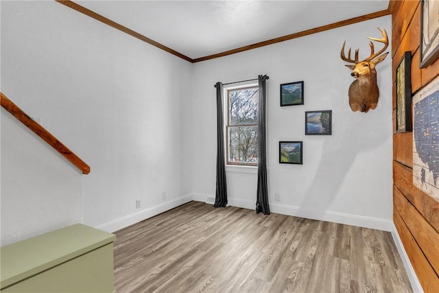 203 Stoney Hollow Rd, Winfield Twp, PA 16023 - spare room featuring light wood finished floors and crown molding
