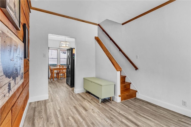 203 Stoney Hollow Rd, Winfield Twp, PA 16023 - foyer with stairs, light wood-style floors, and crown molding