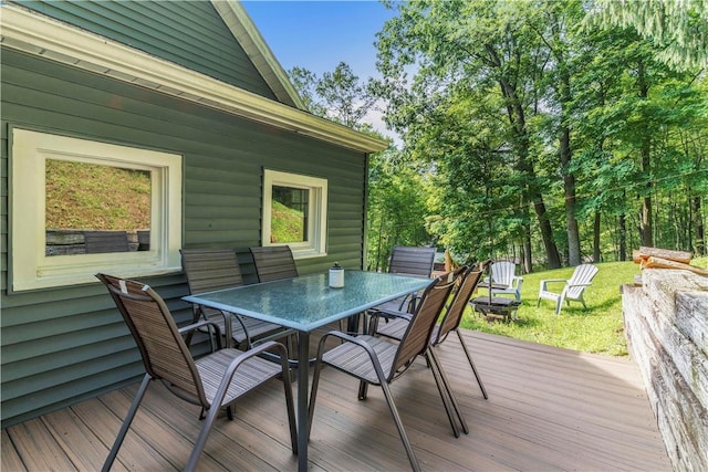 203 Stoney Hollow Rd, Winfield Twp, PA 16023 - wooden deck with outdoor dining space and a fire pit